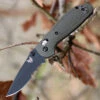 Benchmade Mini Griptilian 556SBKOD-S30V, 2.91" S30V Black Drop Point Combo Blade, OD Green Noryl GTX Handle