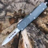 CobraTec Gray FS-X OTF Knife CTKMGRYFS-XMDAG1SS, 3" D2 Steel Dagger Serrated Blade, Gray Aluminum Handle